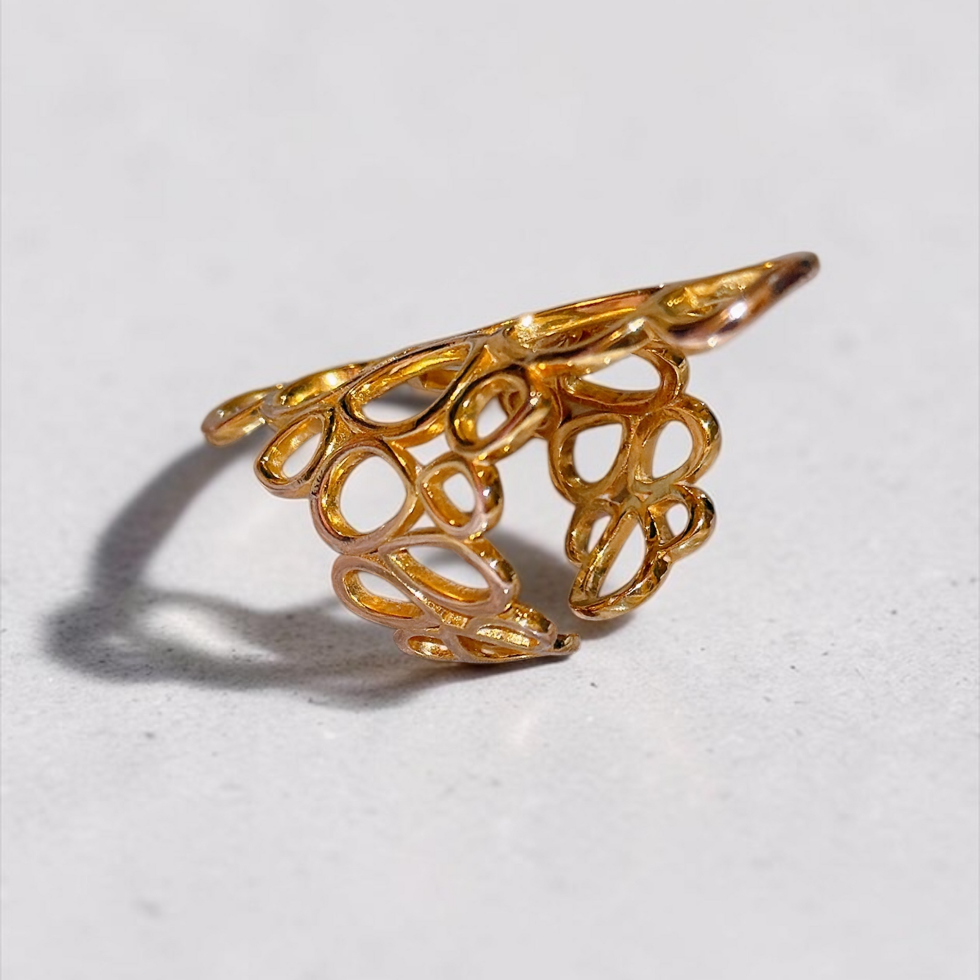 Gold ring with intricate design